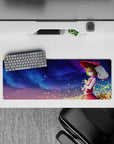 32x12 inches anime girl mouse pad in violet-to-blue night tones with tiny stars and golden leaf confetti.