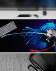 Neon blue and midnight gradient anime desk pad 40x20 inches with orange ribbon accents, moody vibe.