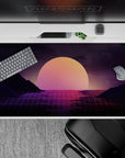 Serene 40x20 desk pad showcases warm orange and pink tones with glowing grid for fans of modern aesthetics