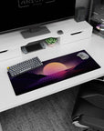 Small but impactful 32x12 desk mat showcases twilight beauty with striking retro-futuristic artistry