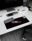 Close-up anime girl peeking from shadows with candy pink eyes, extended mouse pad 28x12 inches.