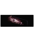Anime girl mouse pad 32x12 inches with tight close-up framing and glossy pink eyes peeking from darkness.