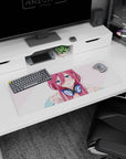 32x12 inches anime mouse pad showing a flustered pink-haired girl in headphones, cute desk art.