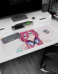 36x16 inches anime mouse pad showing flustered pink-haired girl in big headphones, like she paused your music.