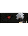 32x12 inches anime mouse pad featuring a ninja with silver hair and glowing red eye in smoky tones.