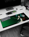 Artistic 36x16 inches desk pad featuring Deku’s raw power and energy, electrifying the scene with green lightning.
