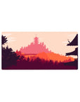 Sunset 32x16 mouse pad featuring warm orange and pink tones and a peaceful silhouette of a temple and landscape for a calm atmosphere