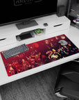 Itachi Uchiha front and center on Akatsuki anime desk pad 36x16 inches with crowd scene backdrop.