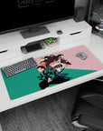 Workspace-ready 36x16 inch desk pad with subtle art of Tanjiro and Nezuko, ideal for anime lovers