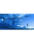 36x16 inches anime desk pad with shoreline panorama, brushstroke sky, clouds, and sparkling water reflections.