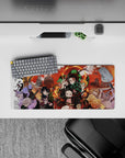 28x12 inches mouse pad with Tanjiro, Nezuko, and the Demon Slayer Corps, perfect for creating a powerful, energetic atmosphere at your desk.