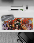 32x12 inches mouse pad featuring Tanjiro, Nezuko, and the Demon Slayer Corps, capturing the intensity of their battle in bold colors.