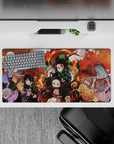 32x16 inches mouse pad showcasing Tanjiro, Nezuko, and the Demon Slayer Corps in action, perfect for adding energy to your workspace.