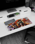 Demon Slayer mouse pad, 28x12 inches, featuring Tanjiro, Nezuko, and the Demon Slayer Corps, ideal for fans of intense action and vibrant design.