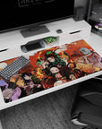 Large 40x20 inches desk pad with Tanjiro, Nezuko, and the Demon Slayer Corps, capturing the fiery energy of the battle against demons.