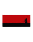 Anime mouse pad 28x12 inches featuring a lone swordsman silhouette in tall grass under a crimson sky.