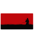 32x16 inches anime mouse pad with lone swordsman silhouette, red sky backdrop, and black grass foreground.