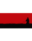 Anime desk pad 36x16 inches with lone swordsman silhouette in tall black grass and crimson sky.