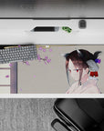 Cozy spring vibe desk pad 36x16 inches in warm gray, lilac petals, white kimono, calm anime art.