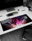 36x16 inches anime desk pad showing red-haired fighter lunging forward, cloak whipping, sparks and shards.