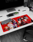 Persona 5 Royal desk pad 36x16 inches featuring Joker, Ann, Ryuji, and Kasumi in vibrant action against a red background.