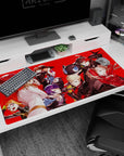 Persona 5 Royal desk pad 40x20 inches featuring Joker, Ann, Ryuji, and Kasumi on a vibrant red background.