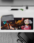 Compact 32x12 inch mouse pad highlighting Nezuko's soft demeanor and demon slayer resilience for fans