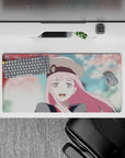Impactful 32x16 mouse pad combines soft pinks, whites, and greens with flowing details for visually soothing yet functional visuals