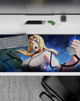 Stormy blue anime desk pad 36x16 inches with glowing sparks, high-contrast blond hair, and fierce energy.