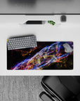 Neon blue, violet, and ember-orange star-speckled mouse pad 28x12 inches for a late-night vibe.