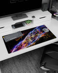 Deep space scene mouse pad 32x16 inches featuring a swirling cosmic ribbon dancing across a starry sky.