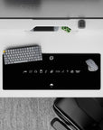 Matte black minimalist anime mouse pad with crisp white linework, dark stealth vibe, 32x12 inches.