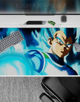 40x20 inches desk pad showcasing Vegeta in Super Saiyan Blue, with a calm yet determined expression and a glowing blue aura surrounding him.