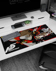 Goro Akechi Crow form anime desk pad from Persona 5, 36x16 inches, featuring red and gold design with star-patterned shadows.