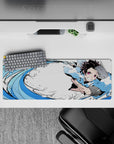 32x12 inches mouse pad featuring Tanjiro’s Water Breathing technique, with bold blue strokes and fierce determination.