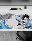36x16 inches desk pad featuring Tanjiro’s Water Breathing technique, with bold strokes of blue and fierce determination in every detail.