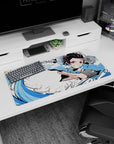 Modern 32x16 inches mouse pad showcasing Tanjiro’s Water Breathing technique, with bold strokes of blue and fierce energy.