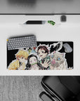 Compact yet detailed 28x12 inch mouse pad showcasing Tanjiro and his team's camaraderie for anime lovers