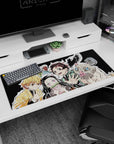 Workspace-ready 36x16 inch desk pad with vibrant Demon Slayer team art, ideal for anime lovers
