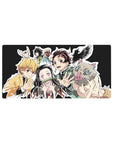 32x16 inch mouse pad featuring the iconic Demon Slayer team including Tanjiro, Nezuko, Zenitsu, and more