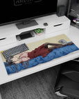 36x16 inches anime desk pad showing silver-haired girl lounging on a blue bed, sparkling eyes.