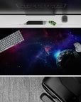 Indigo and violet gradient desk pad 40x20 inches with calm dreamy sci‑fi mood and inky black starscape.