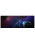 Deep-space galaxy desk mouse pad, star specks, nebula clouds, two planets, 32x12 inches.