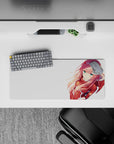 Anime mouse pad featuring Zero Two from Darling in the Franxx, 28x12 inches, showcasing her iconic red suit and pink hair.