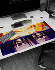 40x20 inches Naruto vs Sasuke desk pad, Shippuden-inspired face-off with Sharingan and chakra eyes.