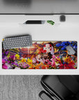 32x12 inches desk mat in sunset gold, candy pink, and deep blue with a dreamy floral festival vibe.