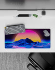 28x12 inches mouse pad with Retro Sunset Peaks, showcasing a radiant sun and neon contours behind flowing waves in a surreal retro design.