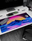Large 40x20 inches desk pad featuring Retro Sunset Peaks, blending a surreal sunset with blue neon mountain contours and flowing neon waves.