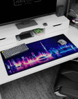 Reflection artwork on 36x16 desk mat captures the essence of a glowing futuristic city in stunning detail