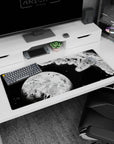 36x16 inches anime desk pad showing a caped hero diving through asteroid shards past a huge glowing planet.